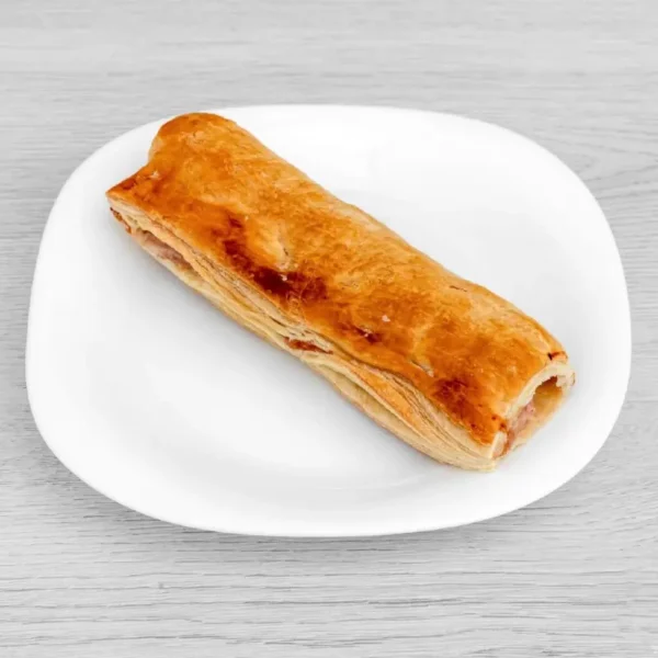 Golden-brown flaky Sausage Roll.