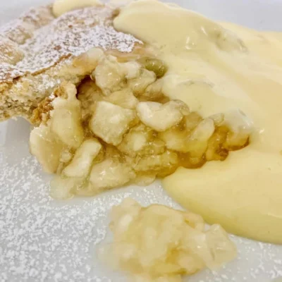 Golden baked apple pie with sweet, spiced apple filling.