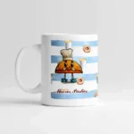 Moores Pasties beach-themed ceramic mug with coastal design.