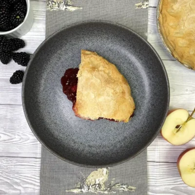 Golden baked blackberry and apple pie with rich, fruity filling.