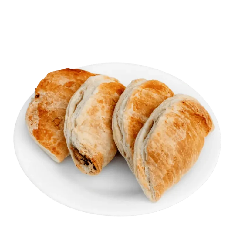 Golden baked cocktail-sized traditional pasty.