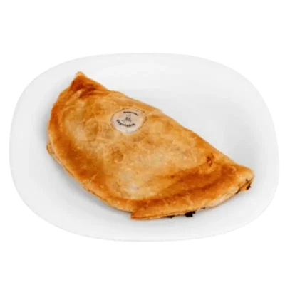 Freshly baked jerk chicken and mango chutney pasty with golden flaky pastry.