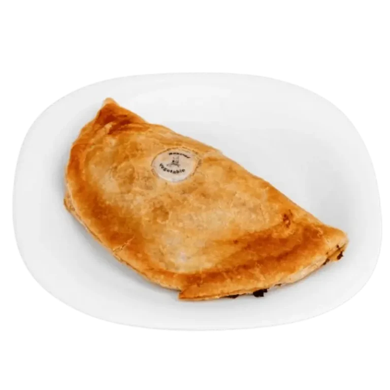 Freshly baked jerk chicken and mango chutney pasty with golden flaky pastry.