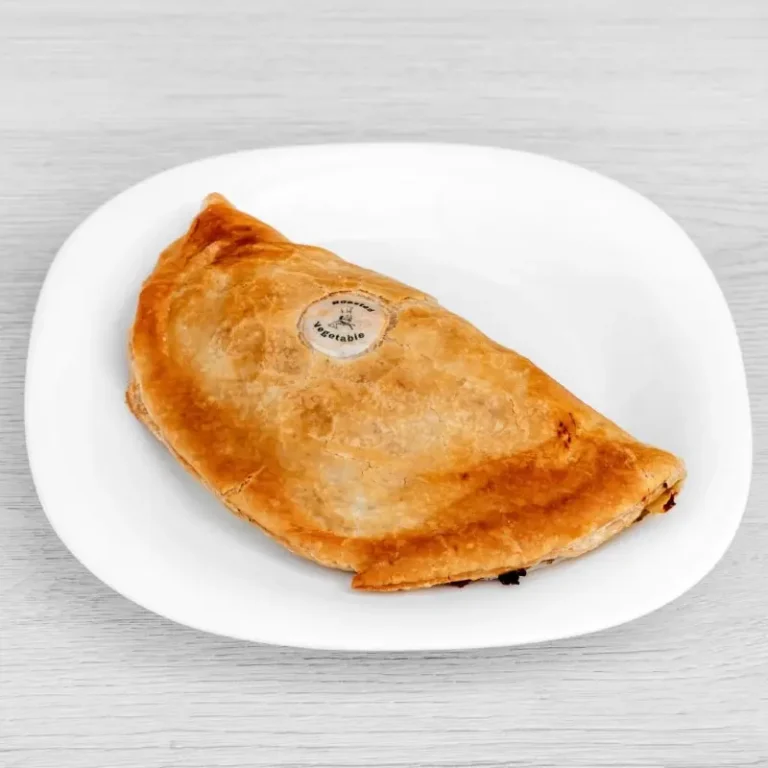 Golden baked vegan pasty filled with a medley of seasonal, flavour-packed roasted vegetables.