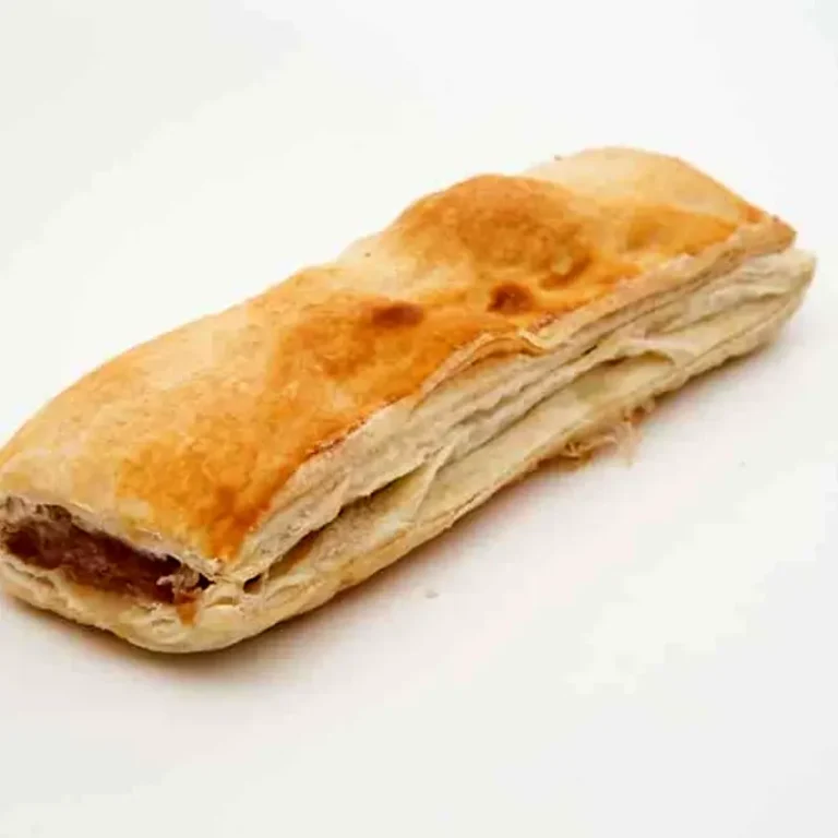 Golden-brown flaky Sausage Roll.